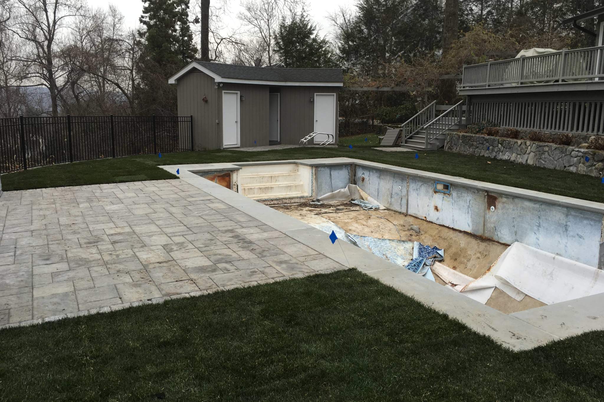 Pool Renovation Before A pool in New York State in need of resurfacing by Neave Pools, a part of Neave Group